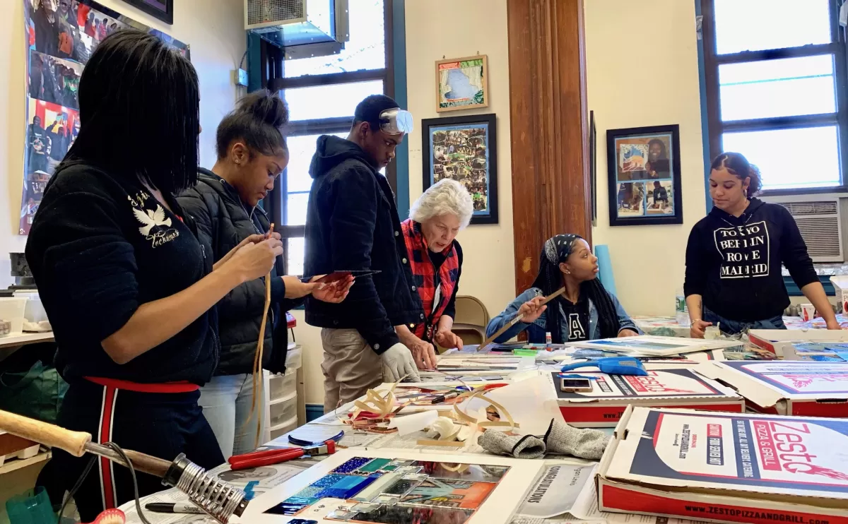 Charry Burr mentor with students - Photo Credit: The Stained Glass Project